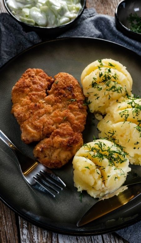 Plate with Chicken Cutlet with Mashed Potatoes and Cucumber Salad