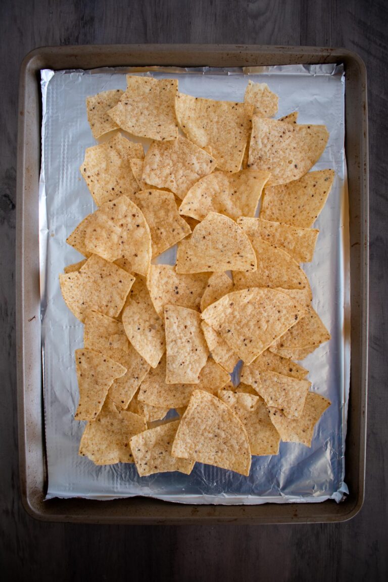 sheet pan lined with  aluminum foil and a layer of chips.