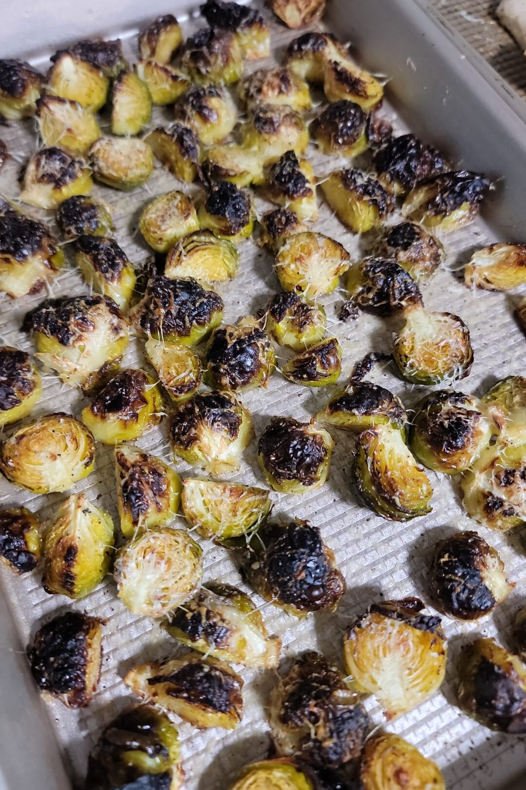baking sheet of roasted brussels sprouts.