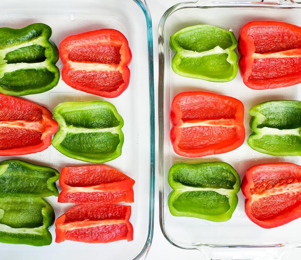 alternating green and red pepper halves in glass baking pans.